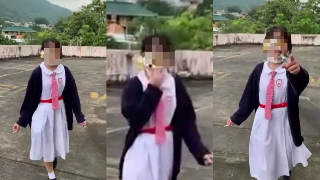 荃灣中學女生疑身穿校服天台食煙 見人拍片即「手指指」 網民反諷：真係「邊有學校唔俾食煙」？