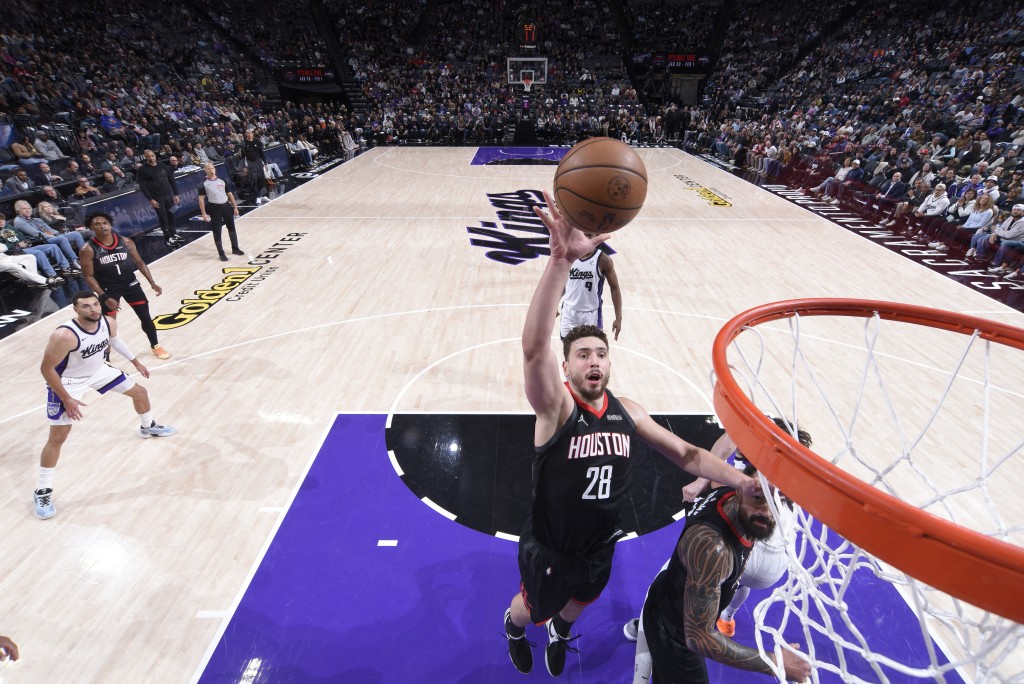 申京攻入19分9篮板。AFP