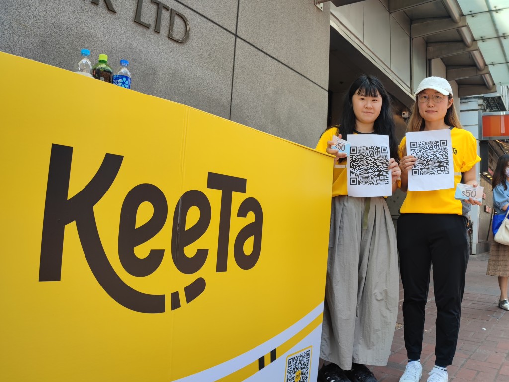 KeeTa在旺角摆摊档，以优惠券吸引市民下载App。