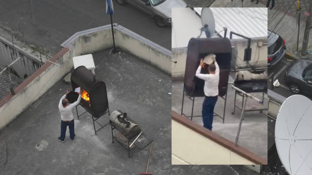 古巴大使館人員在天台焚燒大量文件。(美聯社, X@Daniel Noboa Azin)
