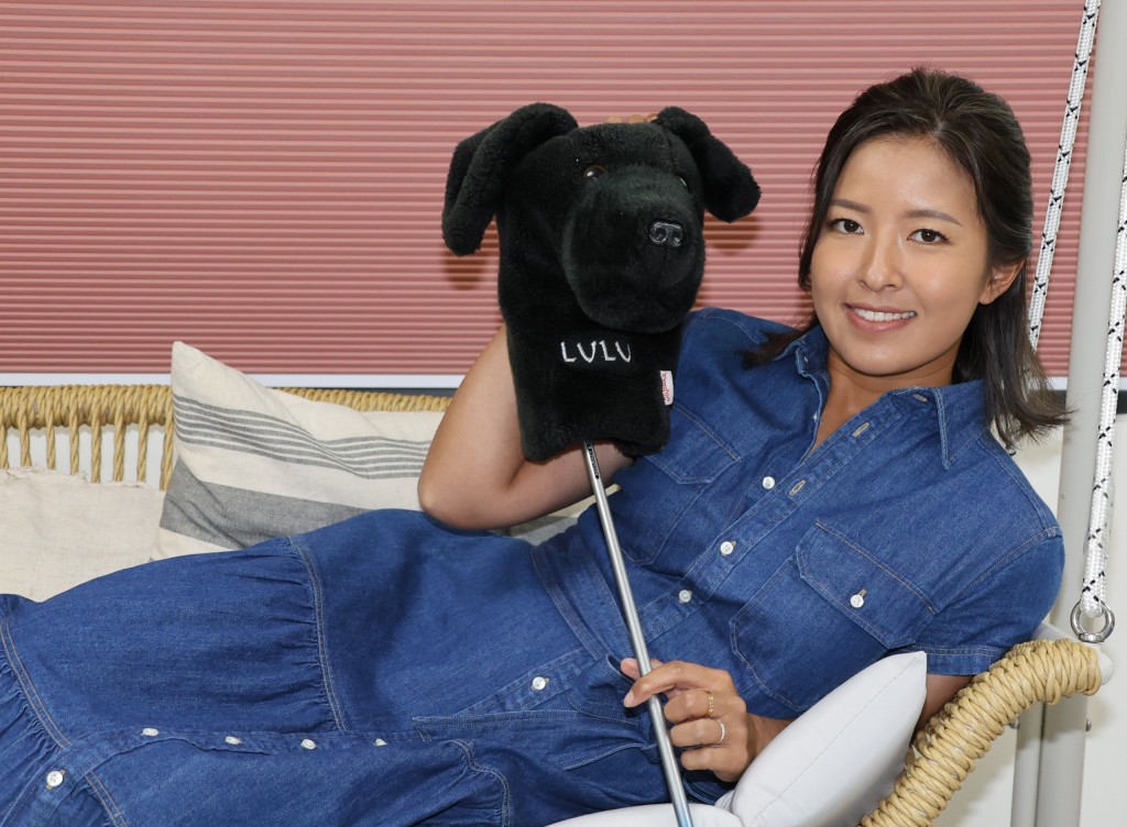 这个黑色的Lu Lu高球棍套是男友送给芷澄的，纪念死去的爱犬。徐嘉华摄