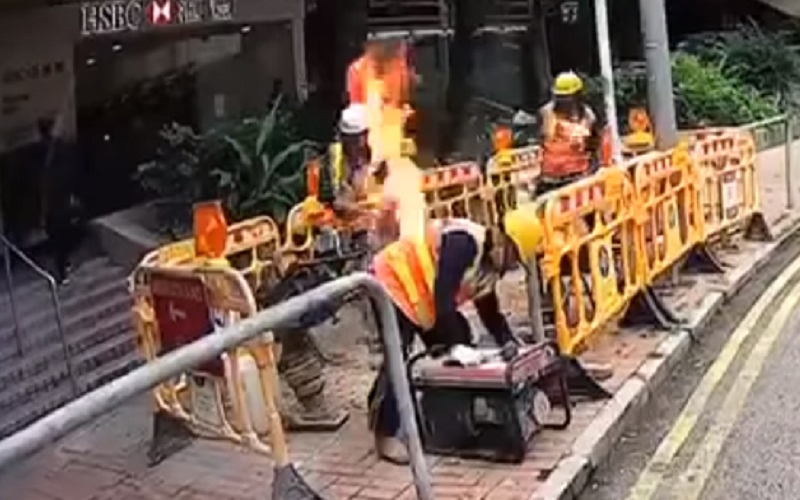 工友疑誤用易燃液救火令起火工人變「火人」。影片截圖
