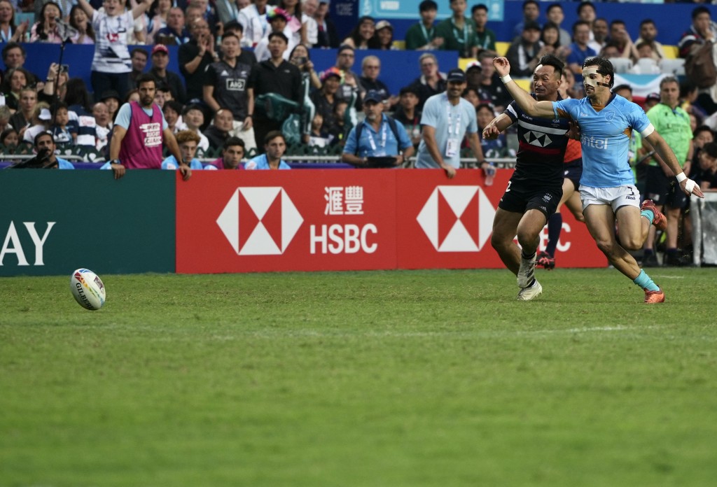 香港男子隊在最後一輪分組賽以14:24不敵烏拉圭。