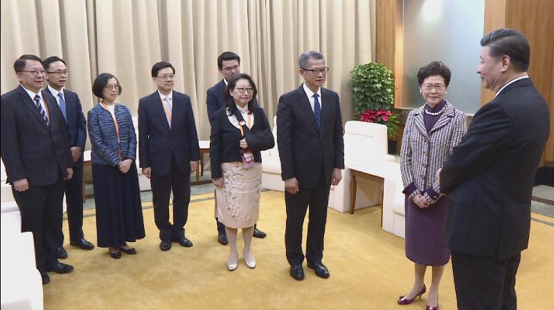 習近平在澳門會見香港特區政府代表團。政府新聞處
