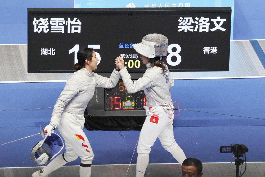 女佩梁洛文(右)16強止步。徐嘉華攝 女佩梁洛文(右)16強止步。徐嘉華攝