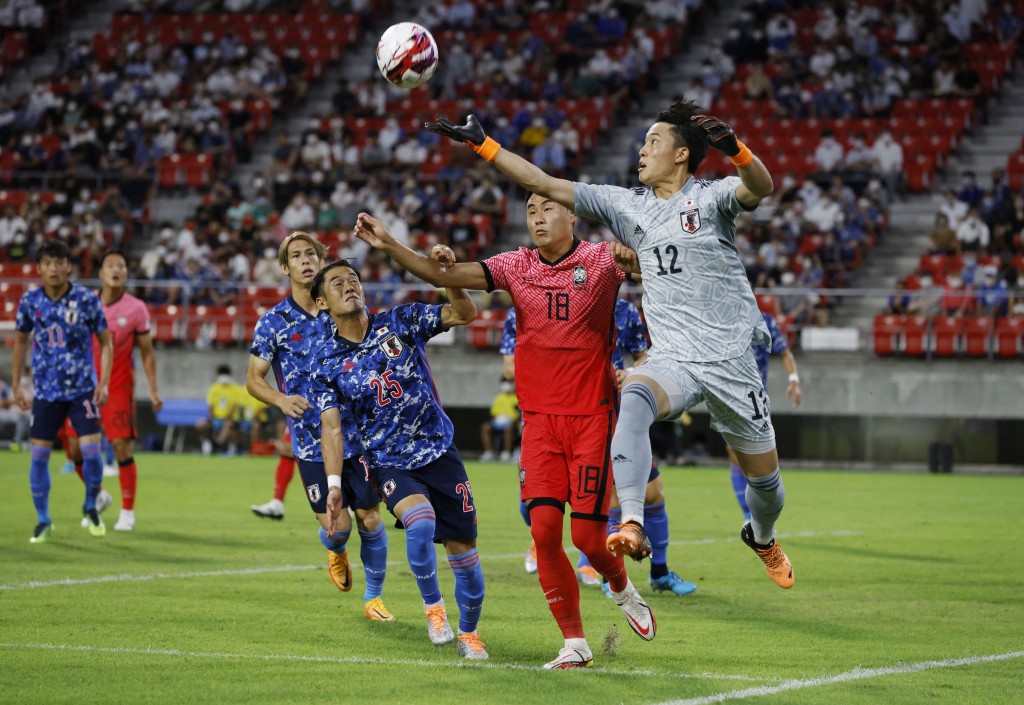 日本於決賽零封南韓捧盃。Reuters