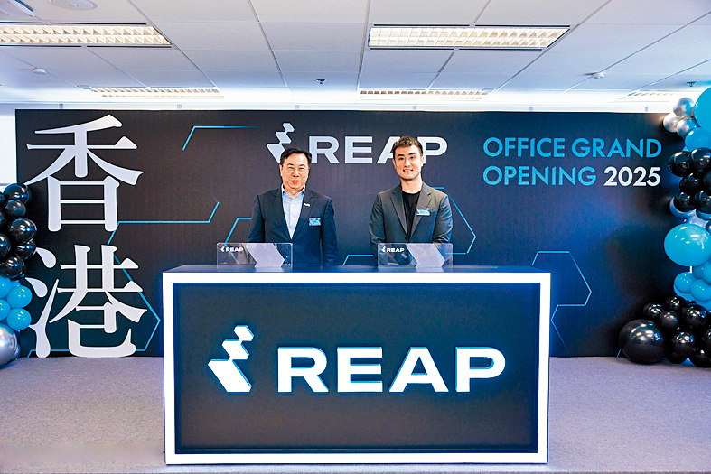 Reap联合创始人康乐文（右）指香港是全球少数能支持多种主要货币大规模结算的金融市场。