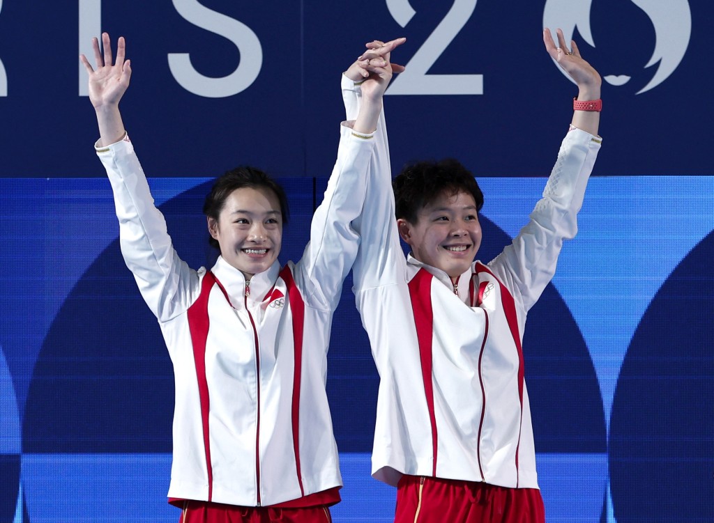 陳藝文(右)/昌雅妮(左)奪跳水女子雙人3米板金牌。Reuters