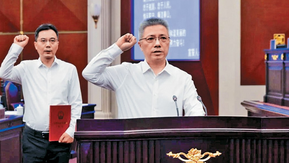 朱忠明任上海代理市長。