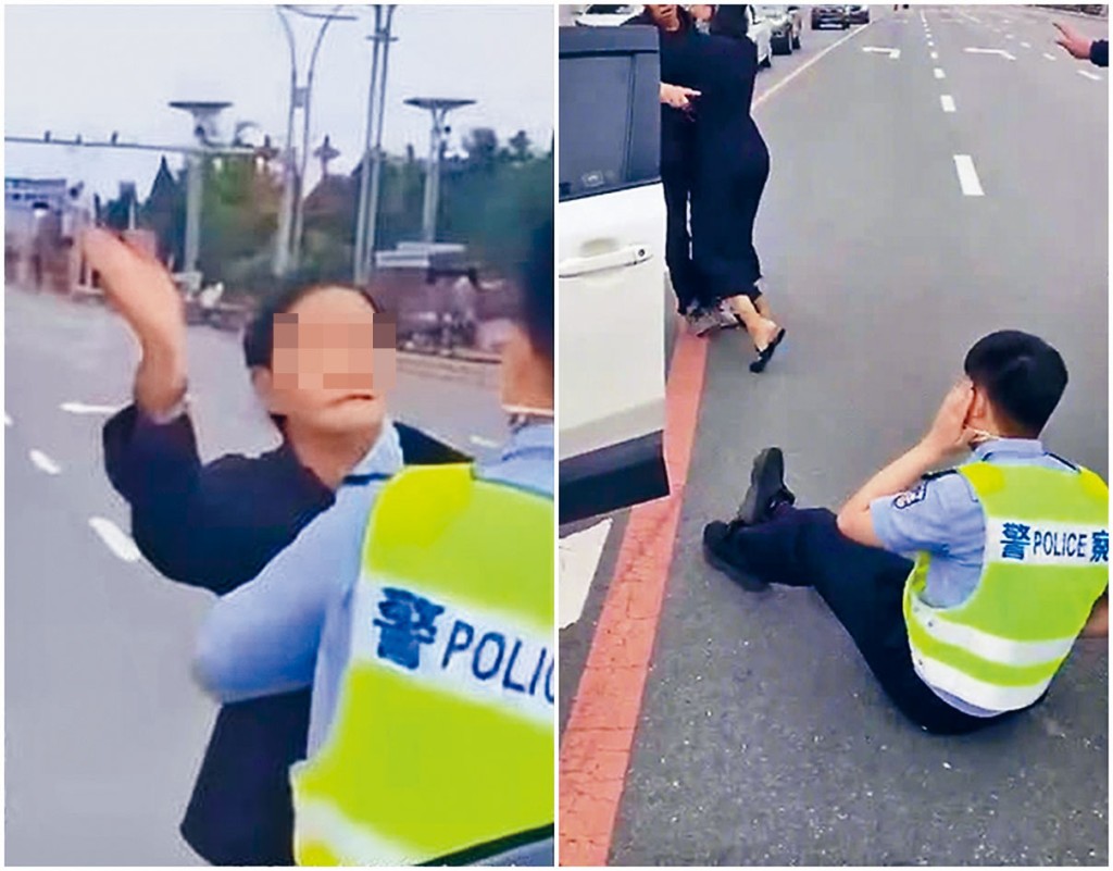 丹東警民衝突,民警倒地。