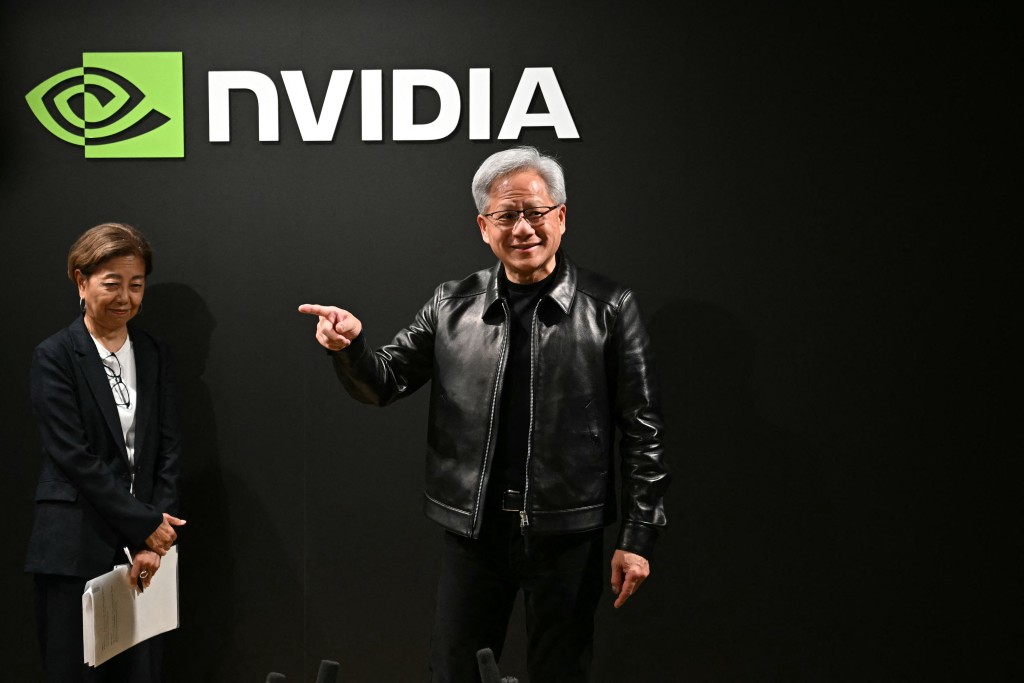 黑色皮褛成为黄仁勋标志。法新社 黑色皮褛成为黄仁勋标志。法新社