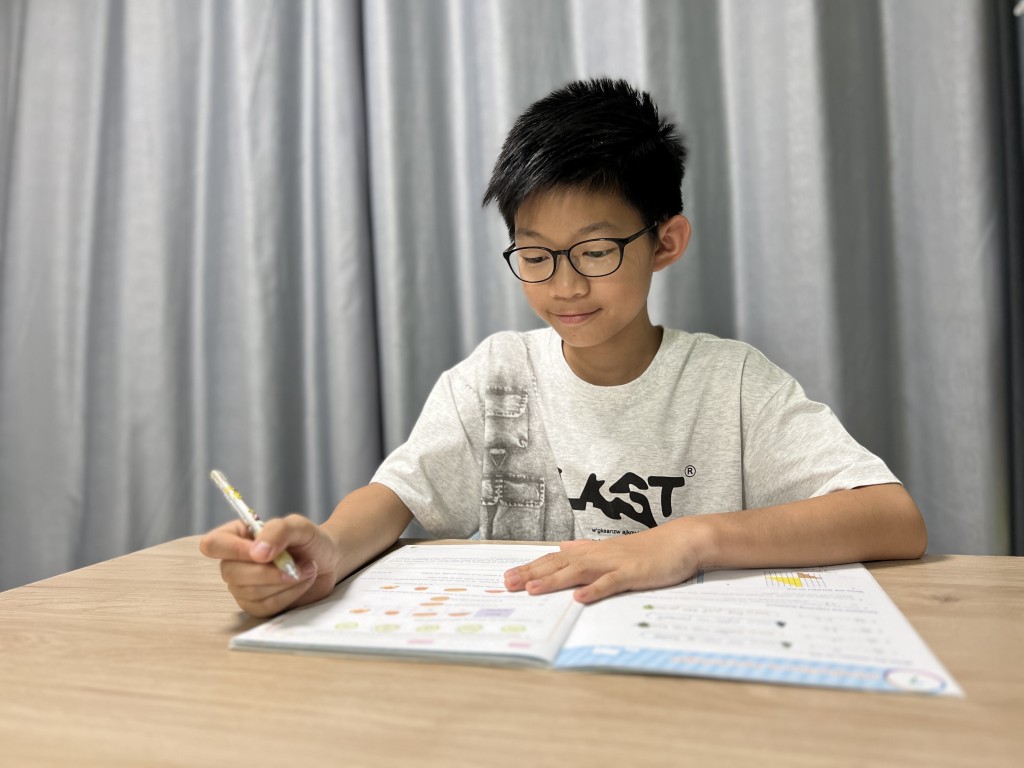 現年12歲的陳米,是由小五直接跳級升讀中一的資優生。(圖片由受訪者提供) 現年12歲的陳米,是由小五直接跳級升讀中一的資優生。(圖片由受訪者提供)
