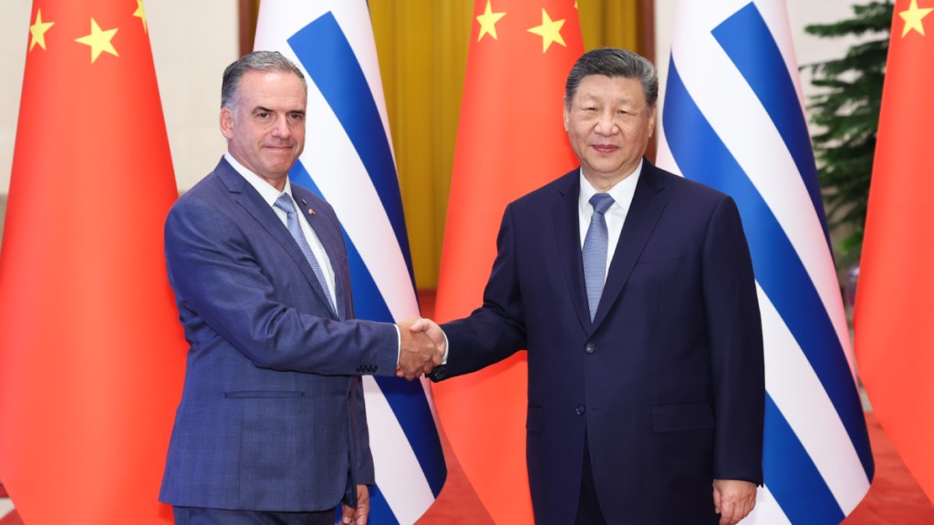 國家主席習近平在北京與烏拉圭總統奧爾西舉行會談。新華社