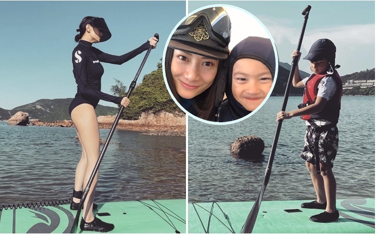 黃伊汶湊住5歲兒子陳真出海，玩外國流行的Stand up paddle board。