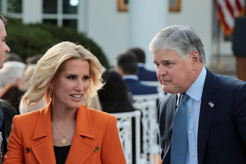 霍士新闻主播英格拉姆（左）访问特朗普。路透社