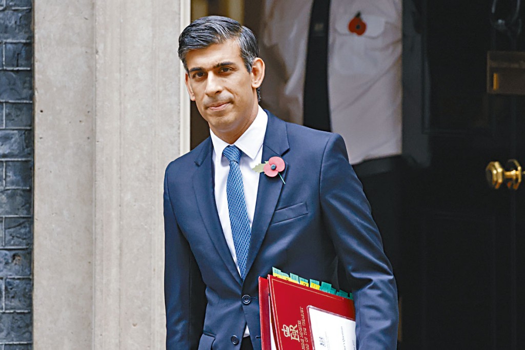 英國首相辛偉誠。