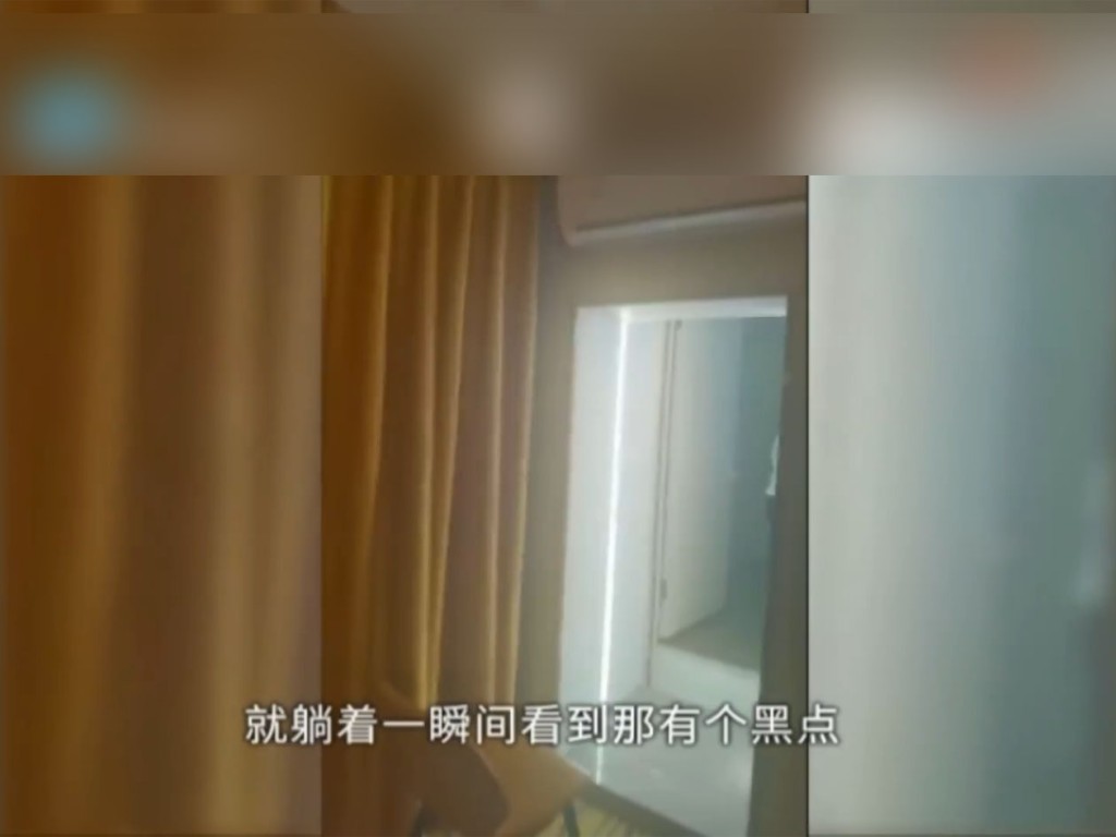 房間發現偷拍鏡頭的一角。影片截圖