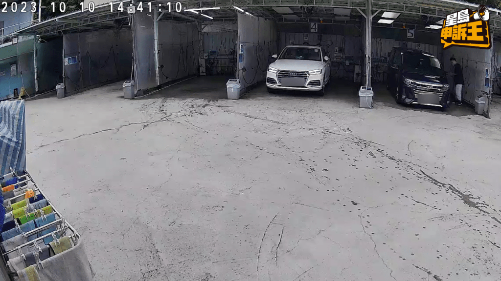 涉事司機若無其事，將車輛駛至另一車位。(CCTV片段)