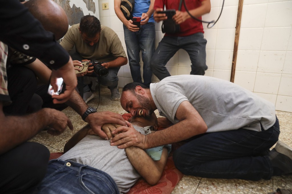 以色列为救出4名人质，却造成近1000人的无辜死伤。  美联社