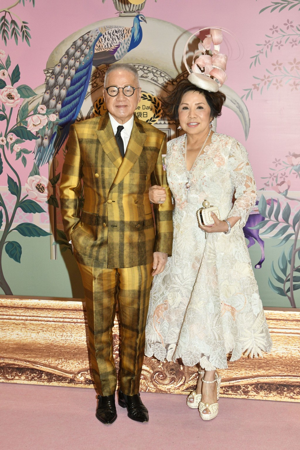 莎莎主席郭少明及太太羅桂珍出席《莎莎婦女銀袋日》。