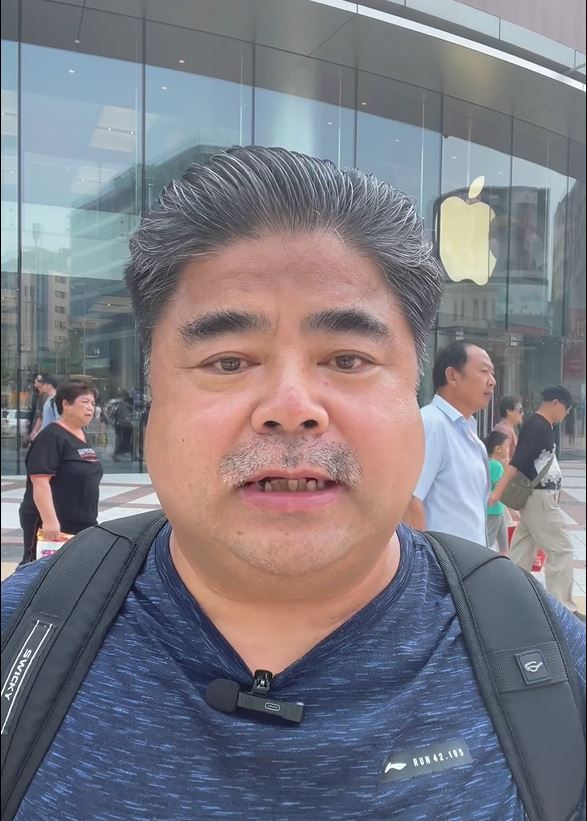 劉金稱永不再購買蘋果產品。影片截圖