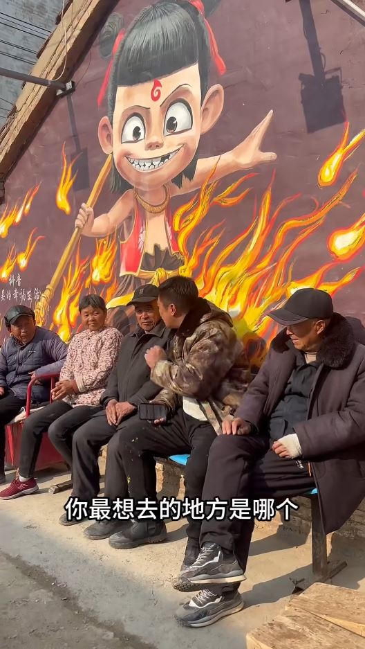 吳承言的巨型牆畫，令小村變網上景點，元旦吸客逾24萬。抖音＠大兵(商丘航拍古城) 