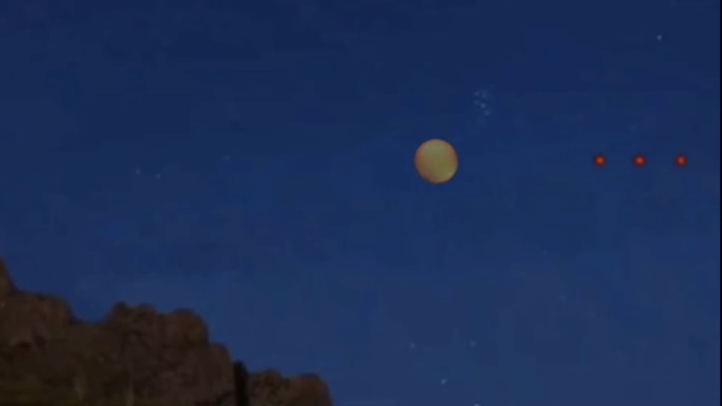根據UFO目影證詞生成的AI影片:紅點逐漸移離燈紅色的大光球。 根據UFO目影證詞生成的AI影片:紅點逐漸移離燈紅色的大光球。