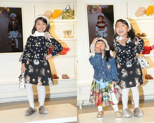 兩姊妹一齊行騷，Celine仲教阿妹飛吻。