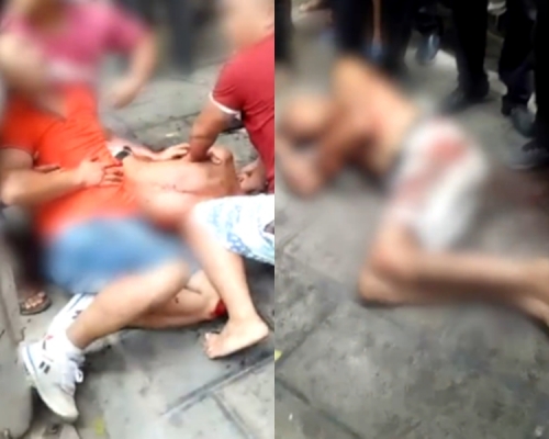 橙衣男子肚子中釘,而地上男子為施襲者。