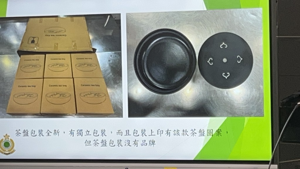 茶盤頂部有異常沉重的黑色圓片。