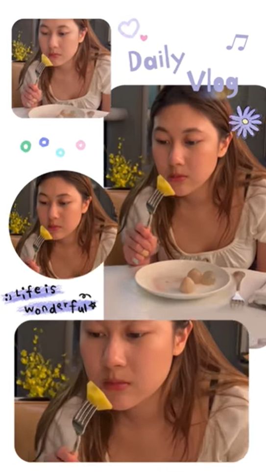 张兆辉与女儿食饭也不忘为她拍片。