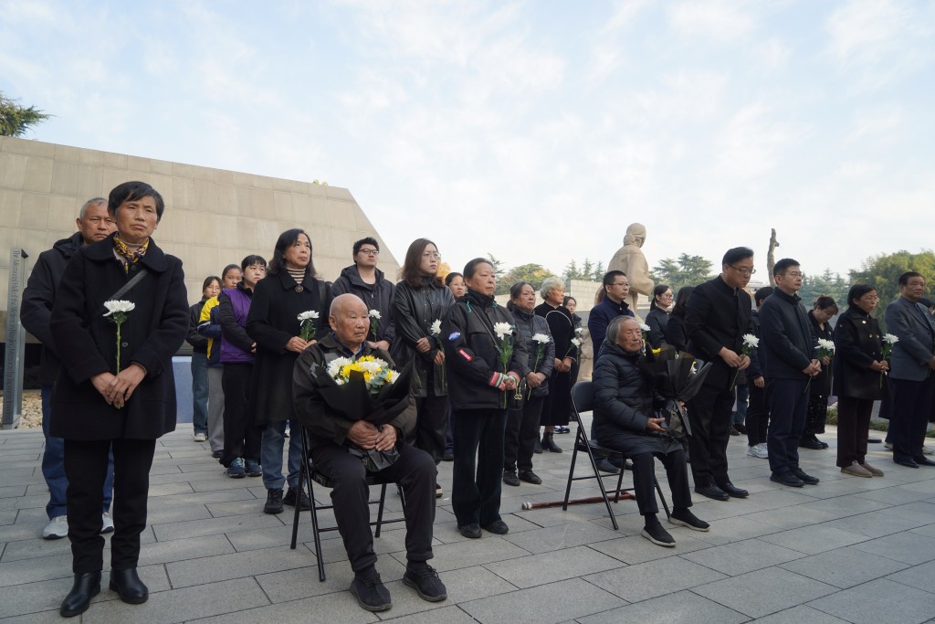 南京大屠殺死難者家庭祭告活動。新華社