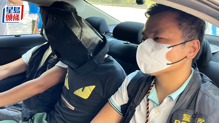 被捕男子帶署調查。劉漢權攝