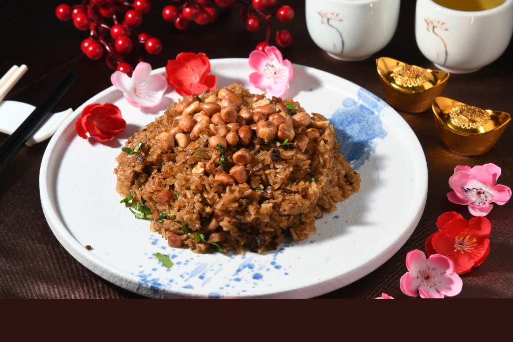 生炒糯米飯——葉師傅秘製的生炒糯米飯新鮮即製，糯米散發臘味豐腴的油香。