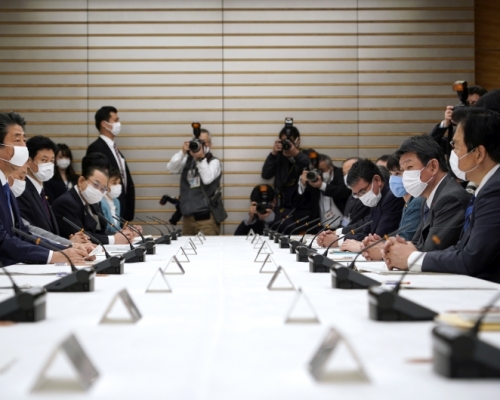 日本疫情諮詢委員會同意頒布緊急事態宣言。AP