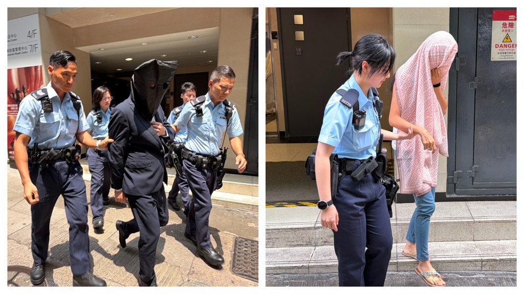 警方到场拘捕一名男子，并带走一名女子调查。梁国峰摄