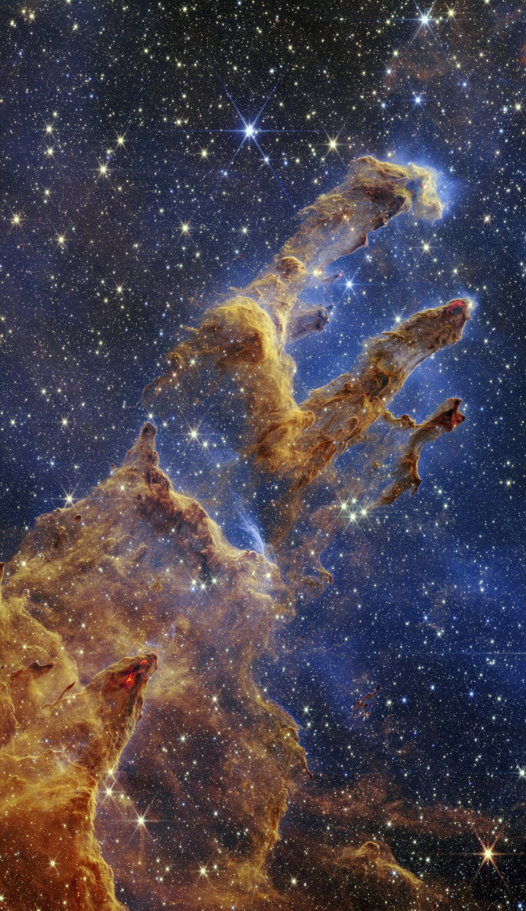 韋伯太空望遠鏡拍下著名「創生之柱」高度精細新影像。AP