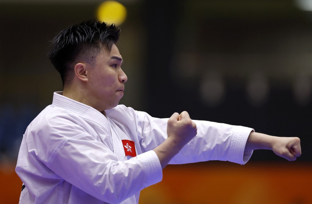 洪晧崴空手道男子個人形銅牌戰以5:0擊馬來西亞選手，為港隊再添一面銅牌。路透社