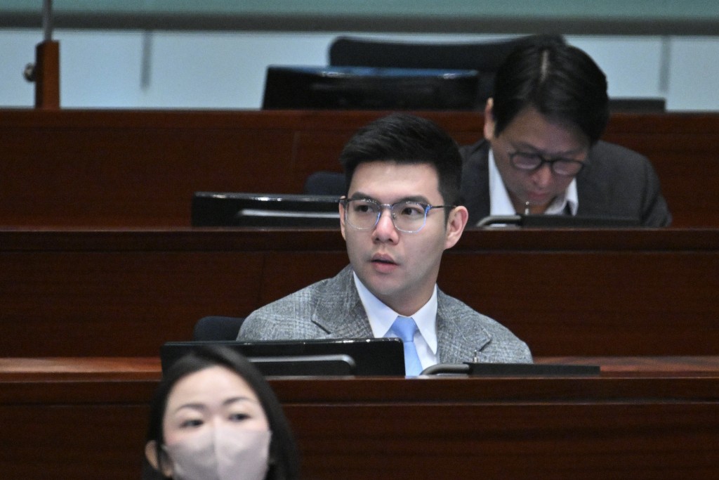 新社联谭镇国。