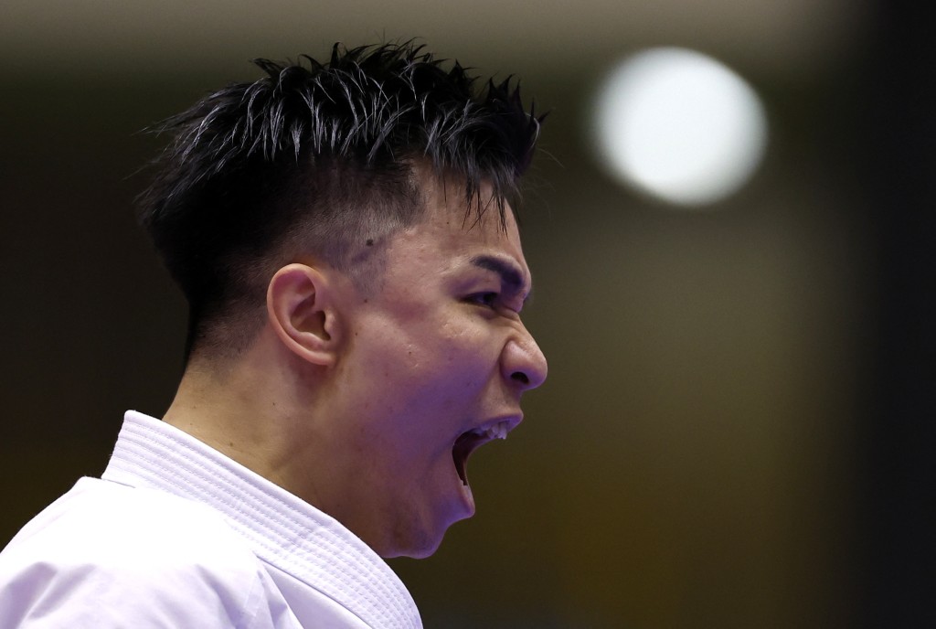 洪晧崴空手道男子個人形銅牌戰以5:0擊馬來西亞選手，為港隊再添一面銅牌。路透社