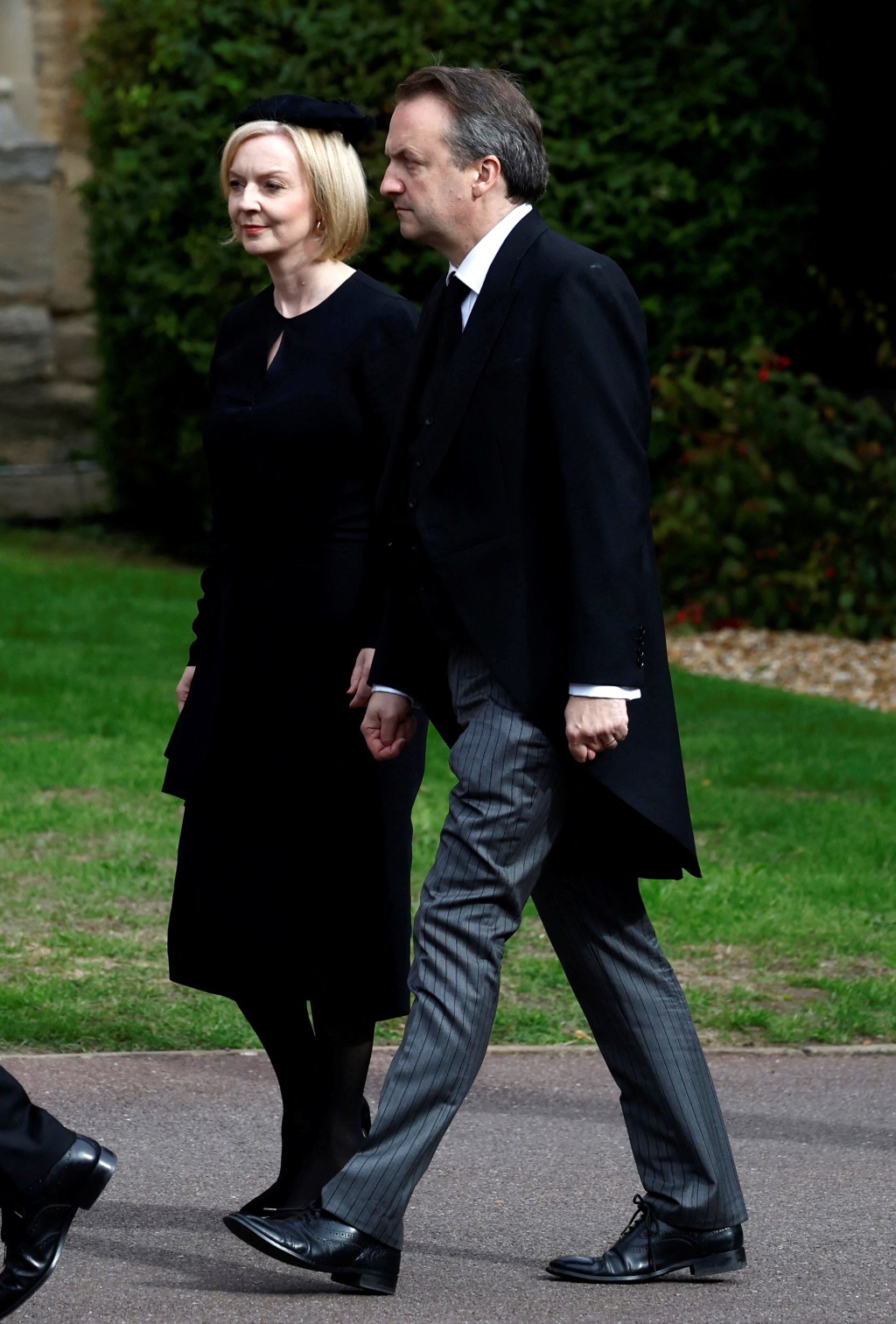 英国新任首相卓慧思和丈夫出席国葬仪式。路透社