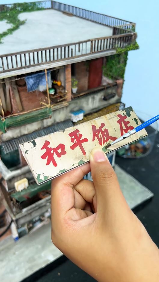 盧慶歡指老房子模型能喚起許多人的舊時回憶，提供情緒價值。