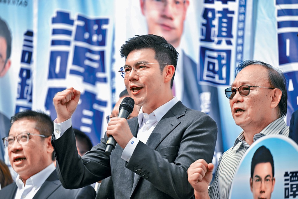 譚鎮國擔大旗代表新社聯出選。