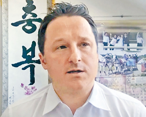 加拿大商人邁克爾被判刑十一年。