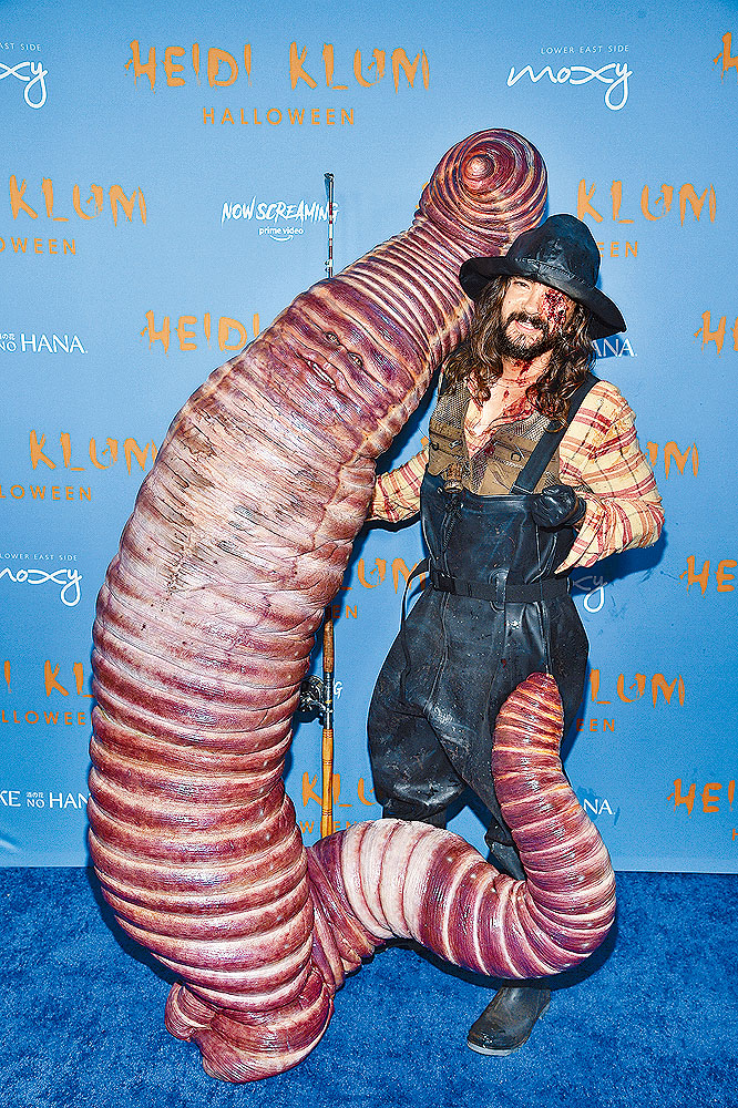 Heidi與老公Tom分別扮成巨型蚯蚓及爛面漁夫。