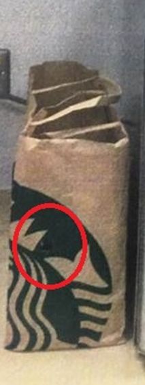 紙袋被挖了一小洞。