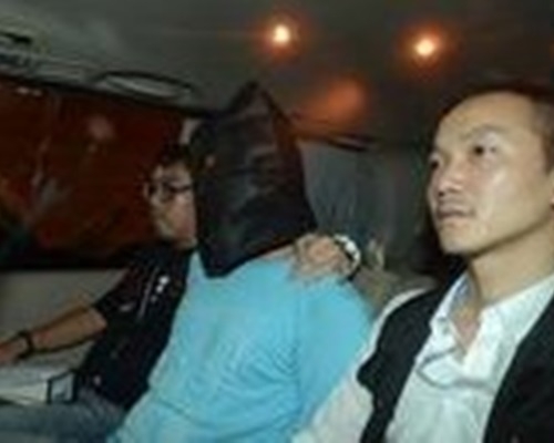 點心師傅(中)扼斃同居女友後埋屍，陪審團一致裁定誤殺罪成立。資料圖片