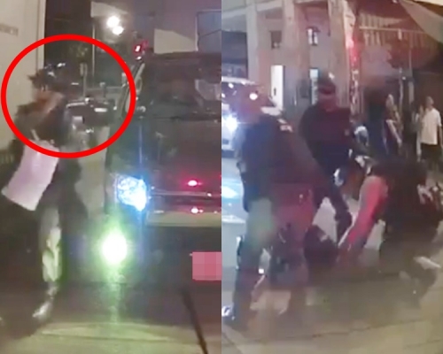防暴警撞到貨Van倒後鏡，司機落車理論被四警制服。影片截圖