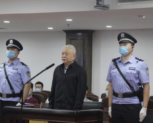 魏传忠出庭受审。网图