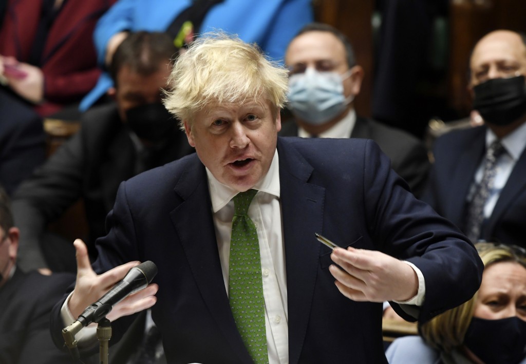 英國首相約翰遜引述科學家指，全英的Omicron疫情已達頂峰。AP圖片
